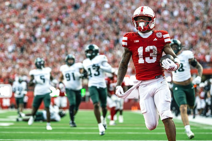 Nebraska wide receiver Nyziah Hunter (13) scores on a 59-yard touchdown reception against Michigan State.