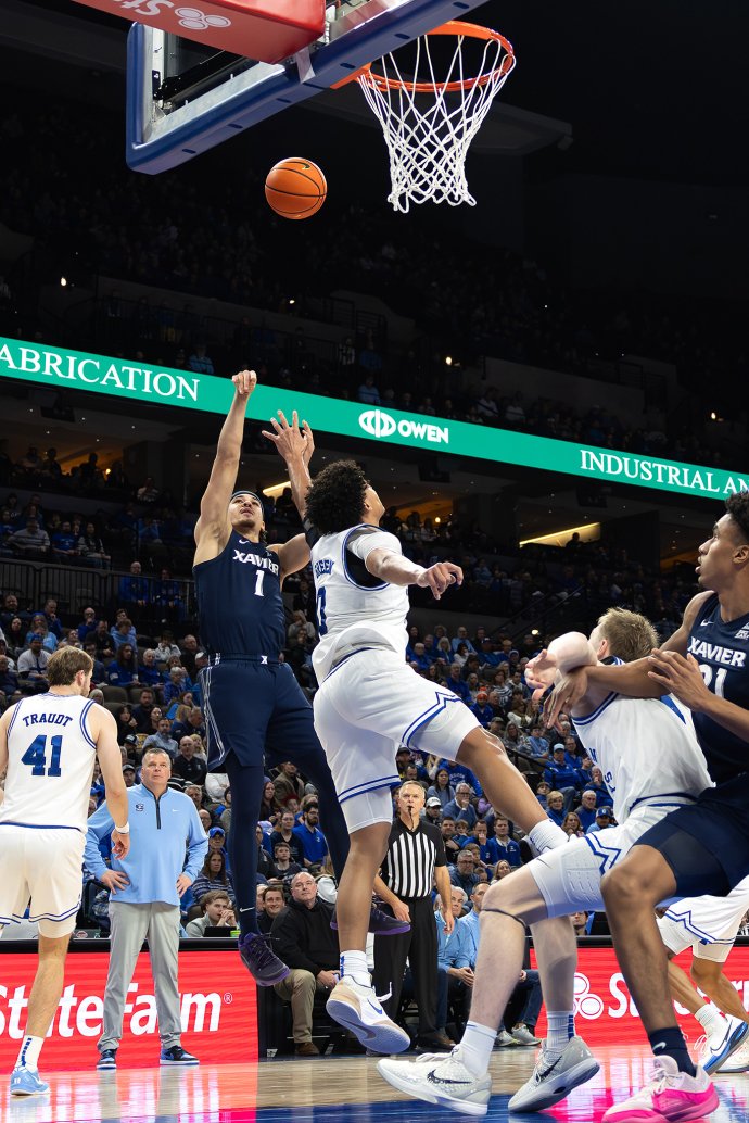 Xavier guard Malik Messina-Moore attempts a shot near the basket against Creighton in the first half.