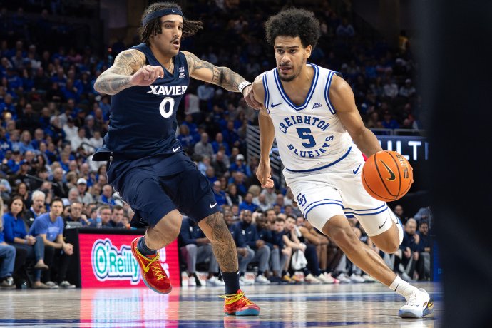Creighton guard Nik Graves drives past Xavier guard Roddie Anderson III during the second half.