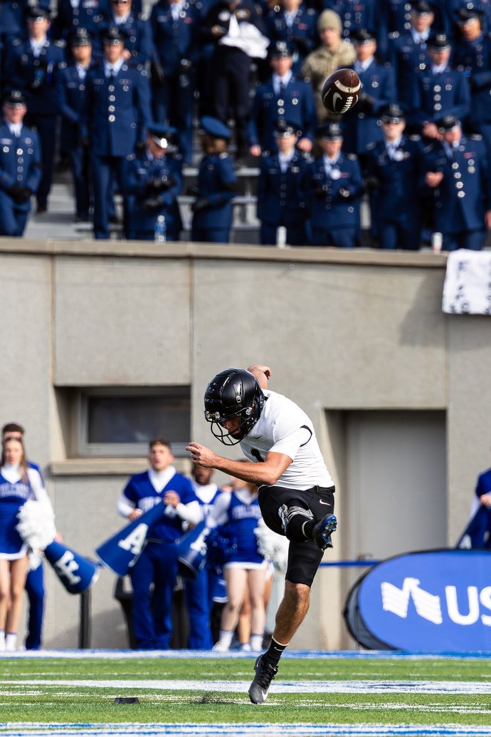 Army kicker Anderson Britton follows through on the second-half kickoff against Air Force.