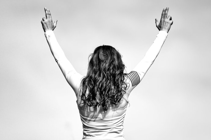 An Army cheerleader cheers on the Black Knights from the sideline during the fourth quarter against Air Force.