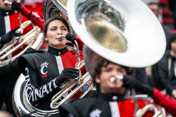 Members of the Cincinnati Bearcats marching band perform the Army Fanfare before the team takes the field.