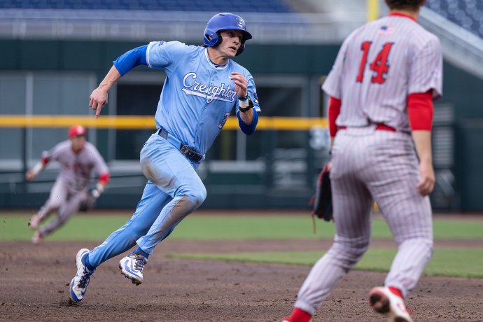 OMAHA - Creighton infielder Matt Scherrman (3) rounds third base during the Bluejays’ 4-3 win over St John's at Charles Schwab Field on April 18, 2025, in Omaha, Nebraska.