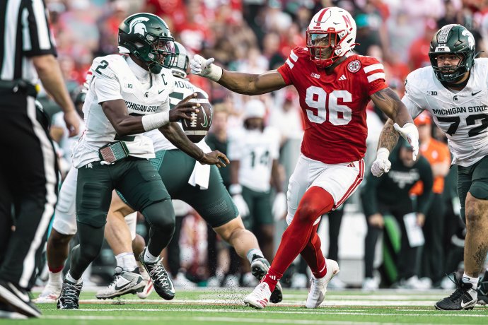 Nebraska defensive lineman Riley Van Poppel (96) pressures Michigan State quarterback Aidan Chiles (2).