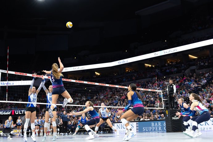 Omaha Supernovas outside hitter Brooke Nuneviller (5) rises near the net for an attack during the second set against Dallas.