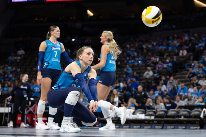 Omaha Supernovas libero Allison Whitten (20) makes a forearm pass during pregame warmups.