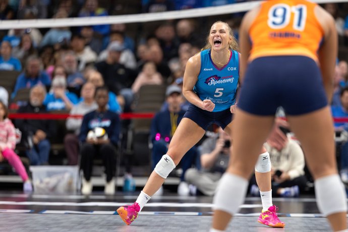 Omaha Supernovas outside hitter Brooke Nuneviller (5) celebrates a second-set point against the Indy Ignite.