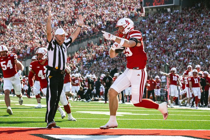 Nebraska tight end Carter Nelson (29) returns a punt blocked by Jamir Conn (13) for a 3-yard touchdown against Michigan State.