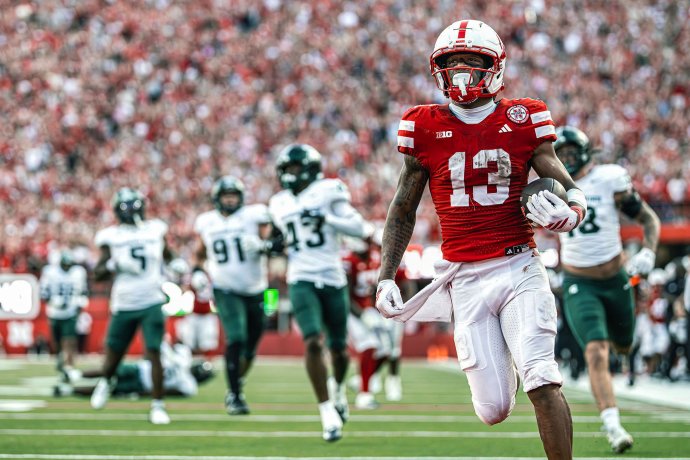 Nebraska wide receiver Nyziah Hunter (13) scores on a 59-yard touchdown reception against Michigan State.