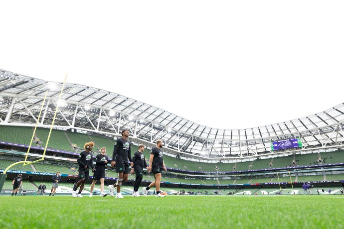 TCU players walk across the field at Aviva Stadium before the game against North Carolina.