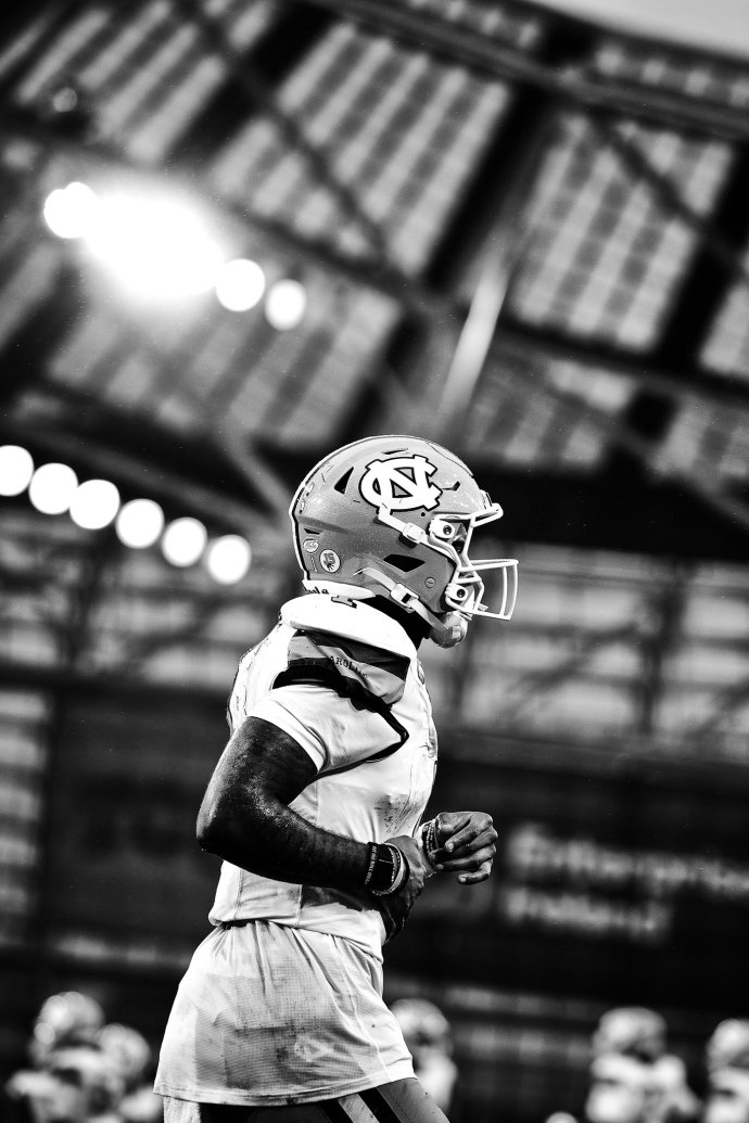 North Carolina wide receiver Jordan Shipp runs under the lights at Aviva Stadium.